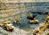 A mine pit is typically a dynamic and busy place