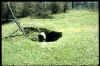 Sinkhole subsidence in someone's lawn from old, abandoned mining